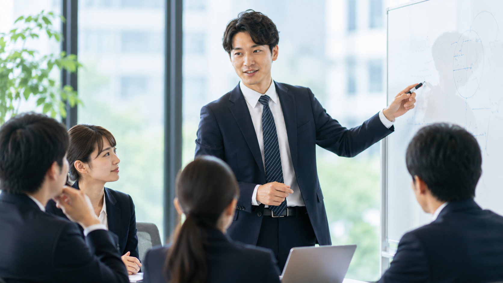 リーダーがチームに方針を共有している様子